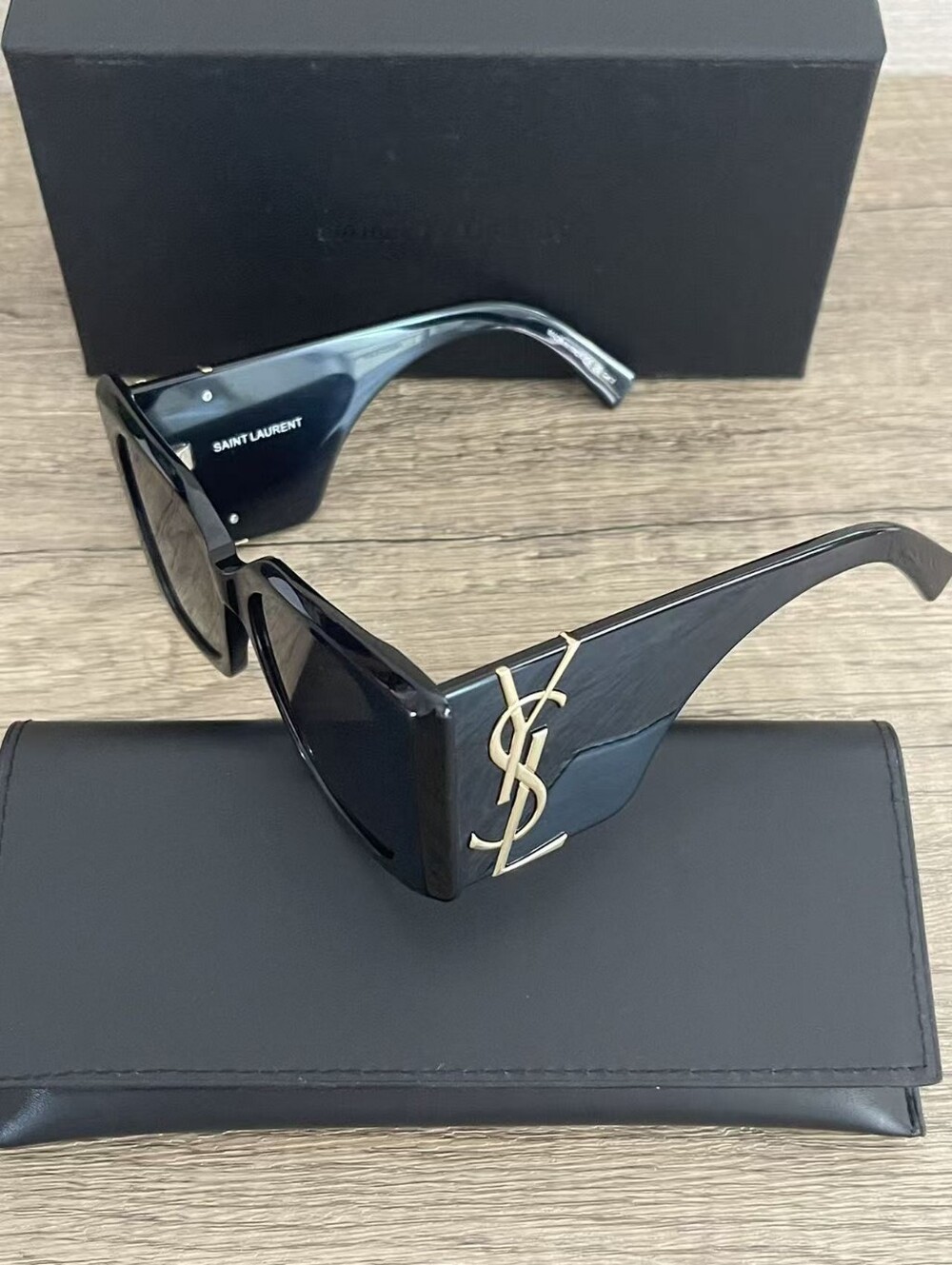 Yves Saint Laurent Black Sunglasses with Gold YSL Emblem